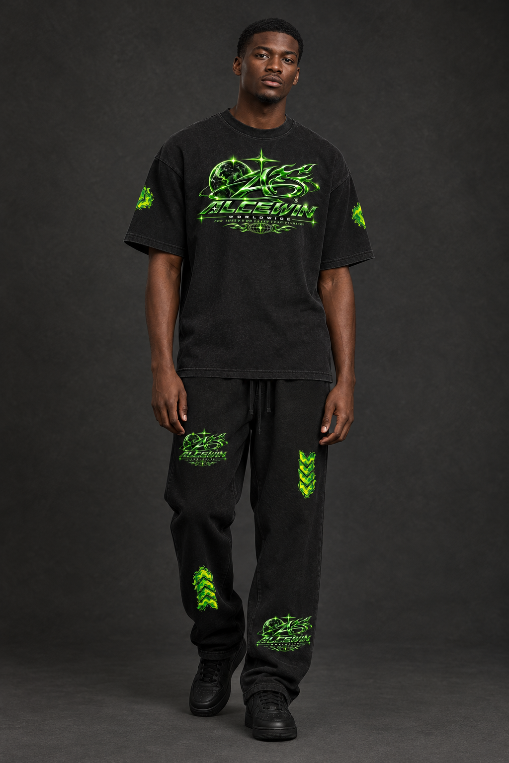 Black male model wearing the Alce Win outfit in a three-quarter pose