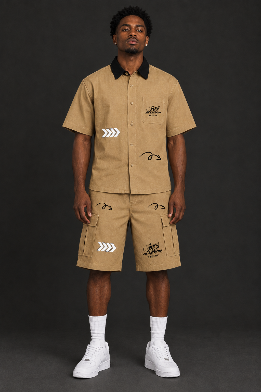 Front-facing model wearing the matching Alce Win shirt and shorts