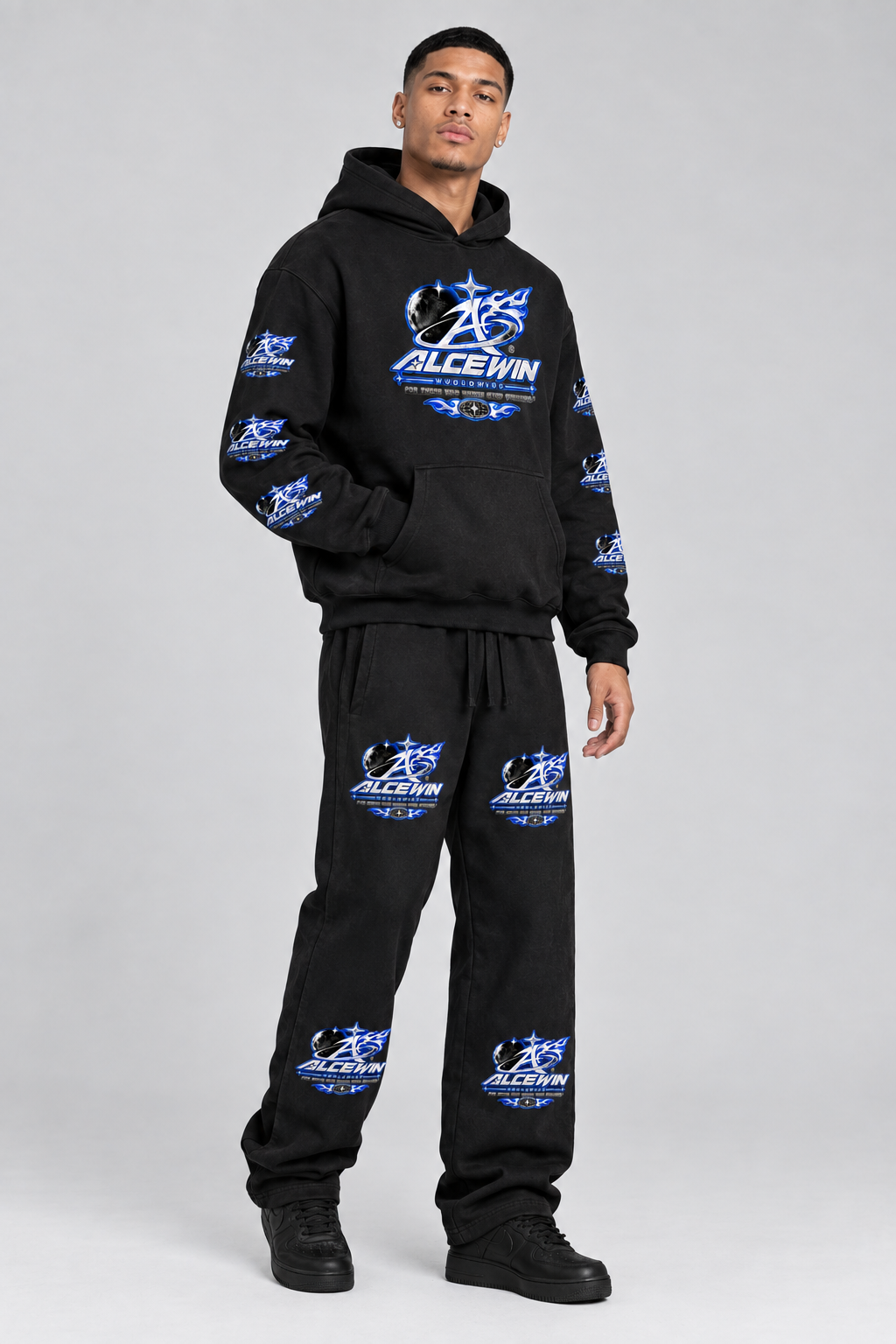 Three-quarter view of male model in the matching Alce Win outfit
